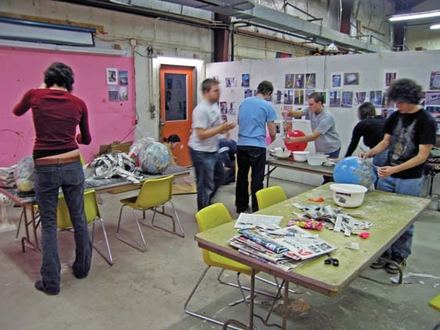 People making piñatas at the workshop